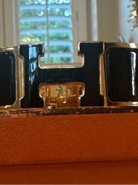 Authentic Hermes black enamel clic clac bracelet